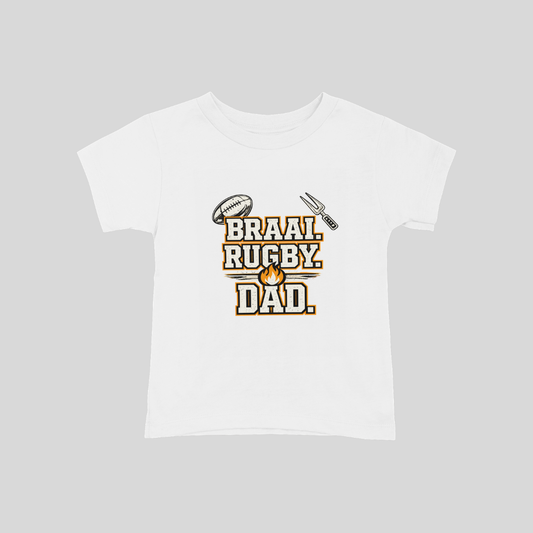 White t-shirt with 'Braai Rugby Dad' text and graphics on a gray background